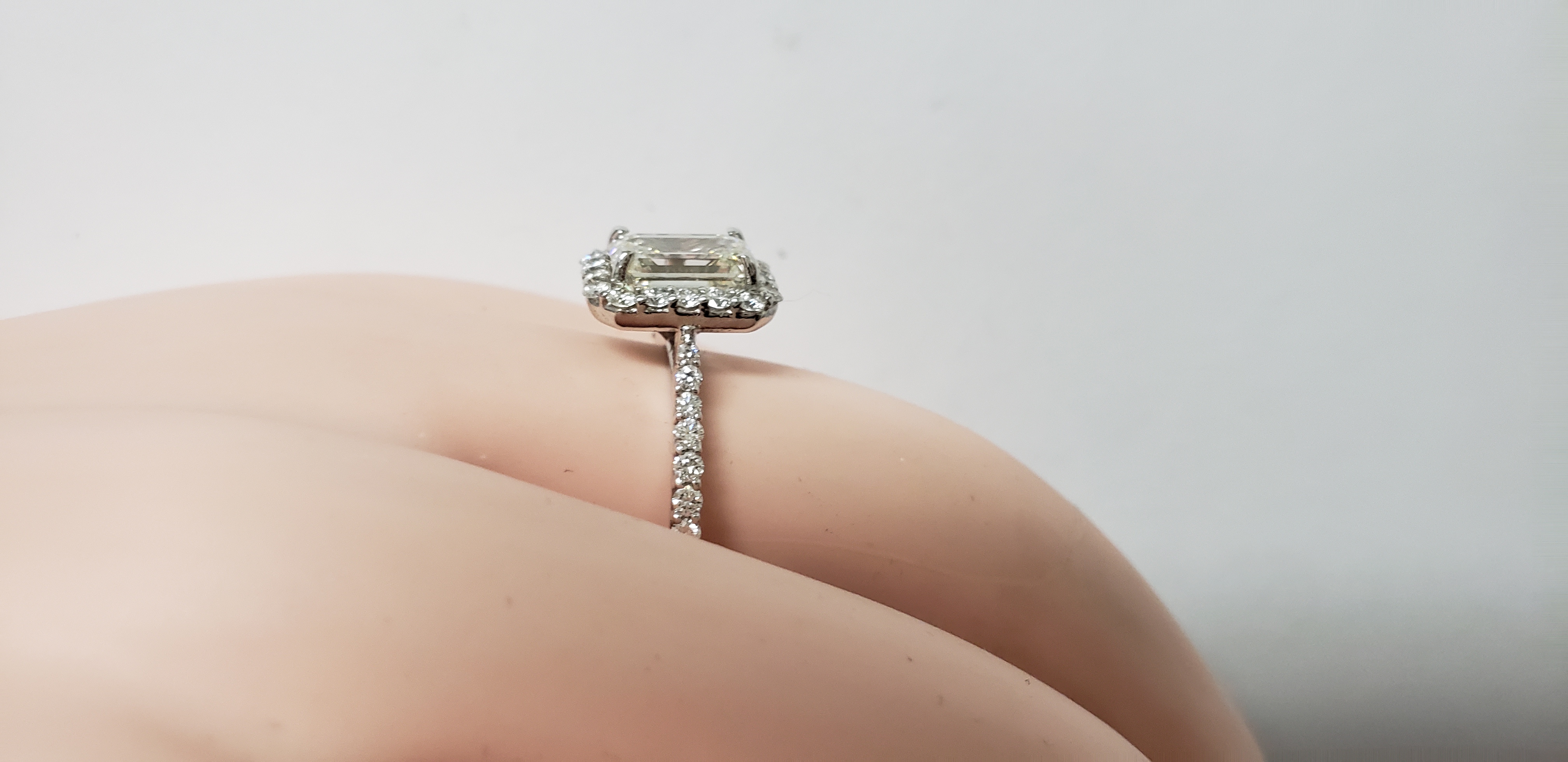 Emerald & Round Diamond Halo Ring